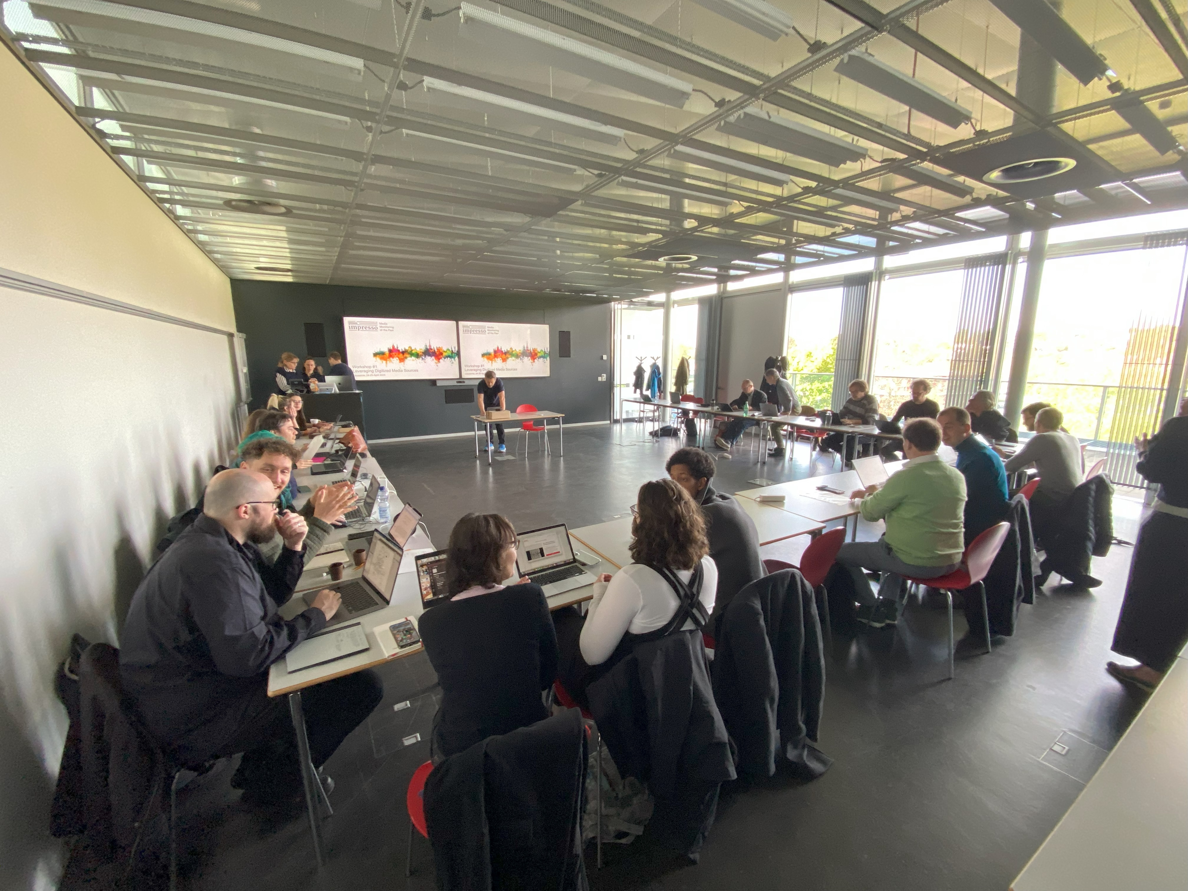 Participants engaged in a session at the Impresso workshop in Lausanne