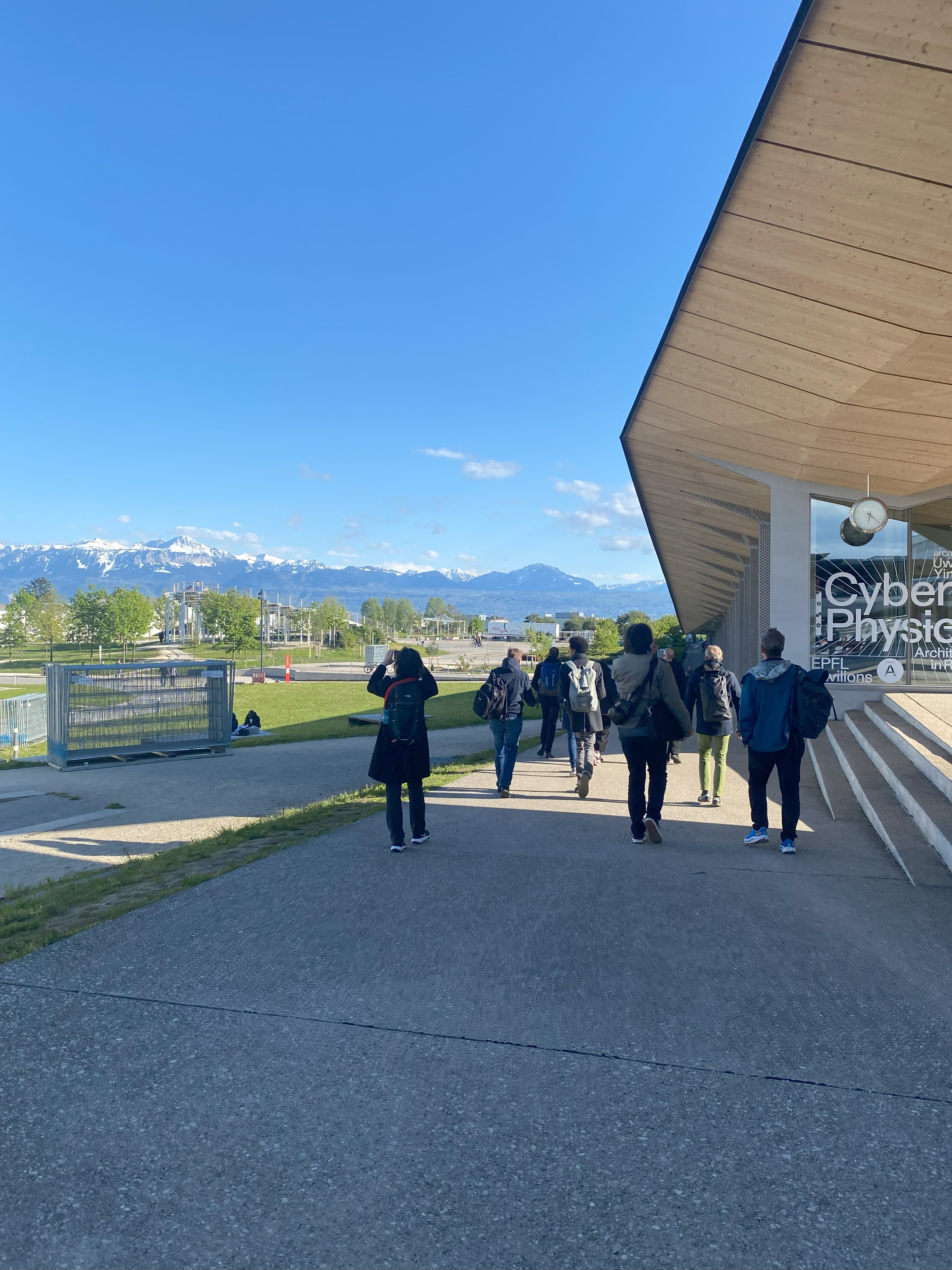 Participants enjoying the scenic surroundings of EPFL, Lausanne, as the first Impresso workshop comes to a close